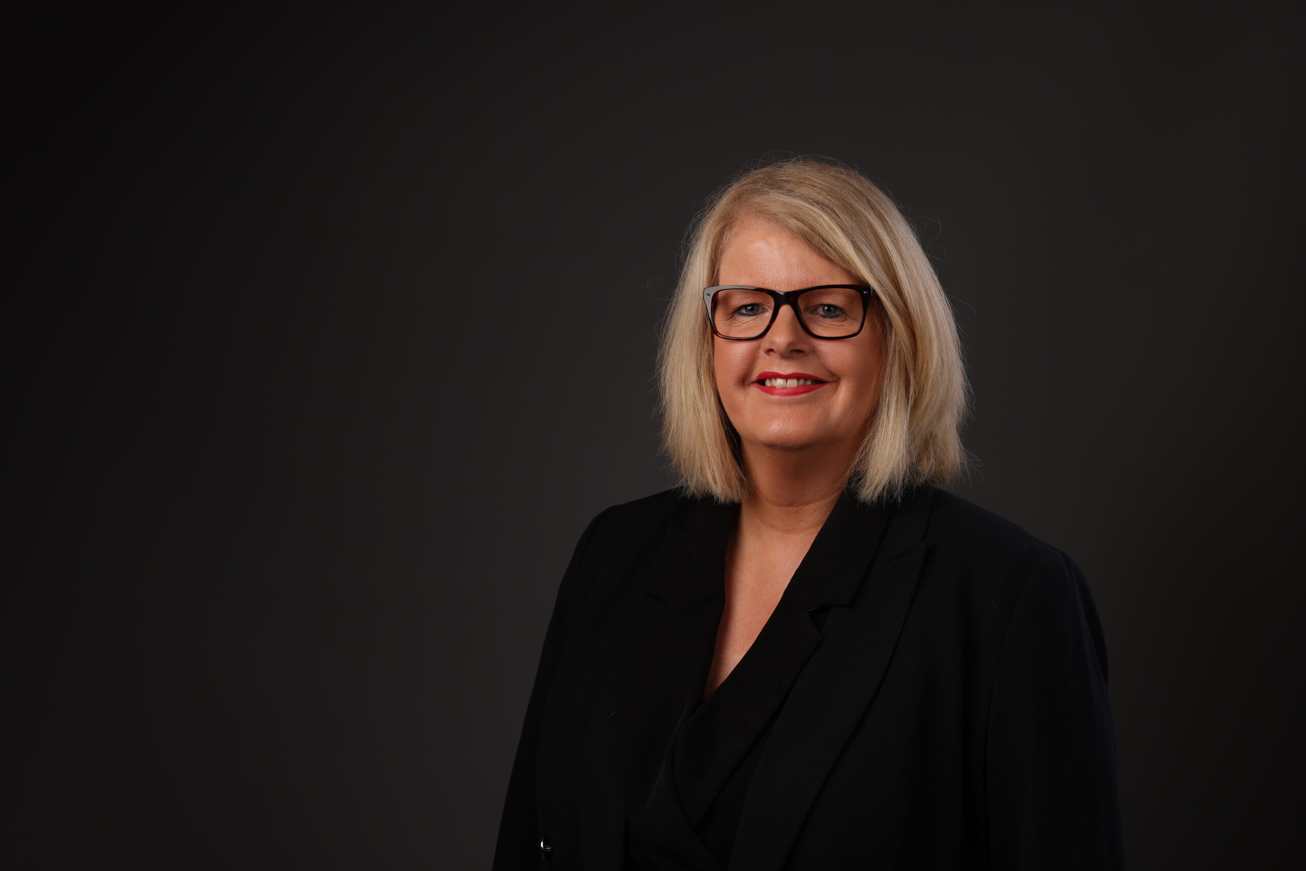 A professional headshot of Karen Charlton, A Personal Assistant at Steven Docker Associates.